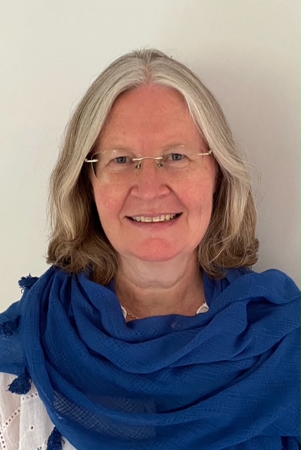 Portrait of counsellor Anna Tweedie smiling against a light background – warm and welcoming image.